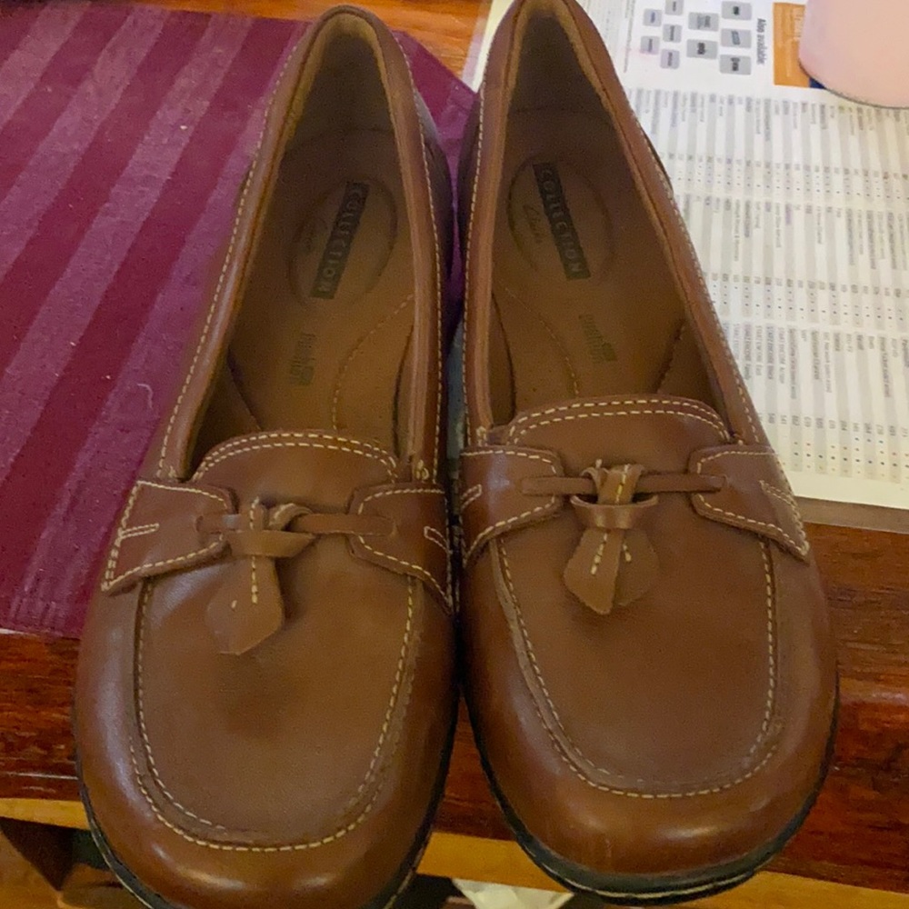Clark’s brown leather loafers